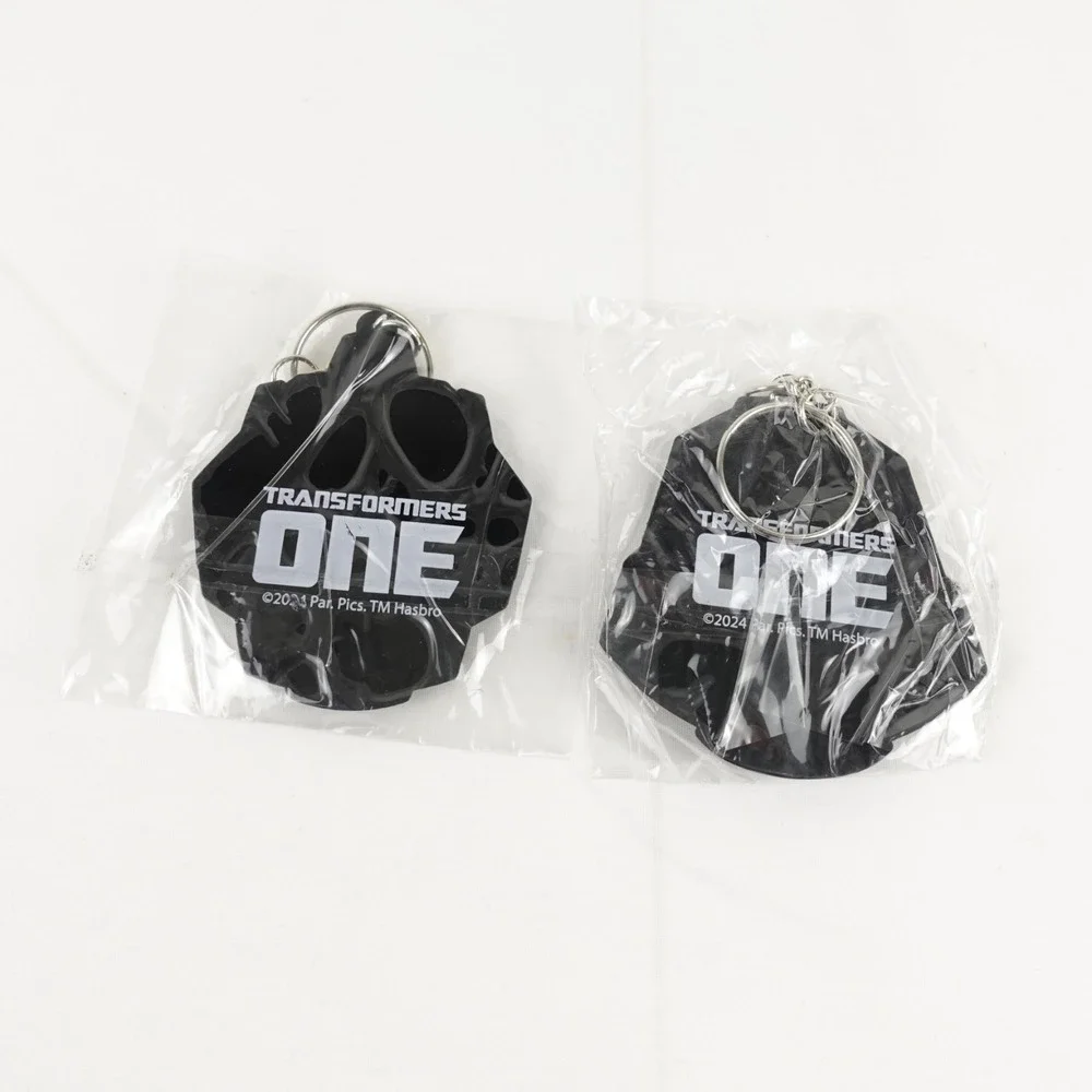 Transformers One (2024) Optimus Prime Megatron Keychain AMC Fan Event Exclusive
